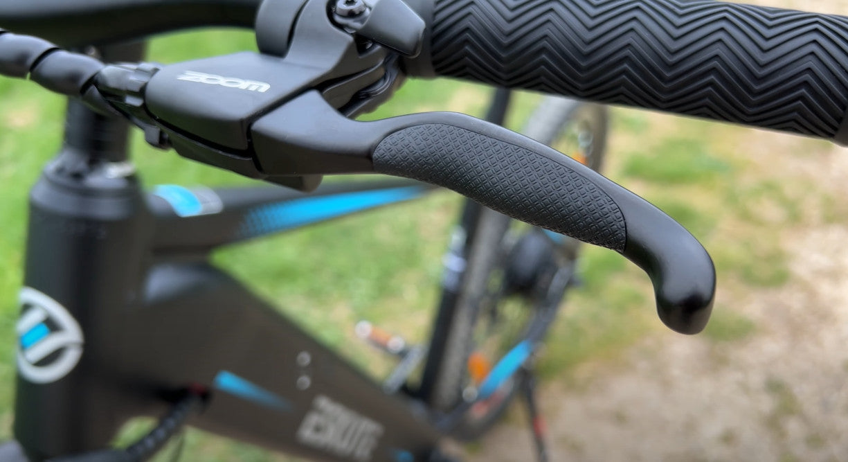 Bromshandtag på elcykelns styre